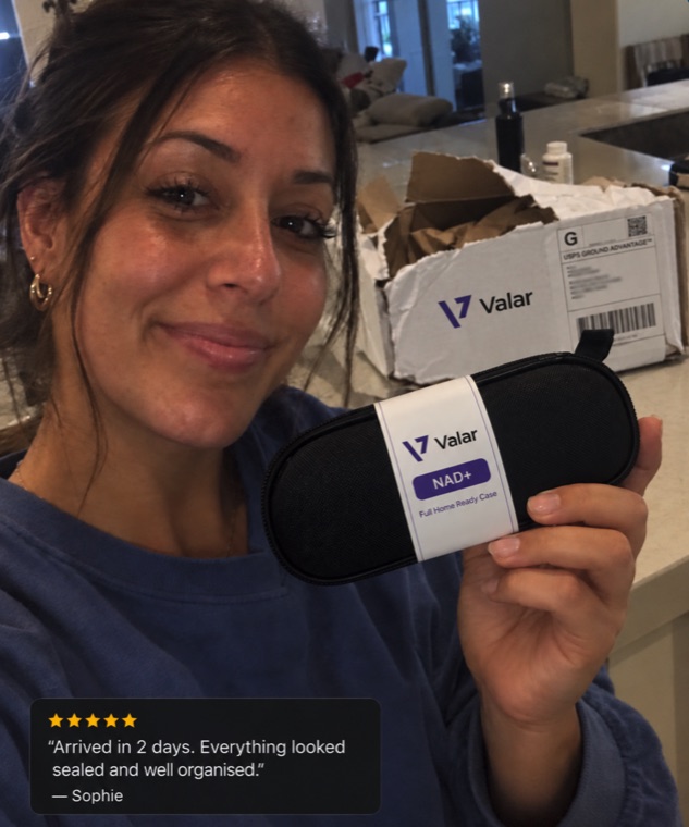 Real customer holding a Valar case, five-star review